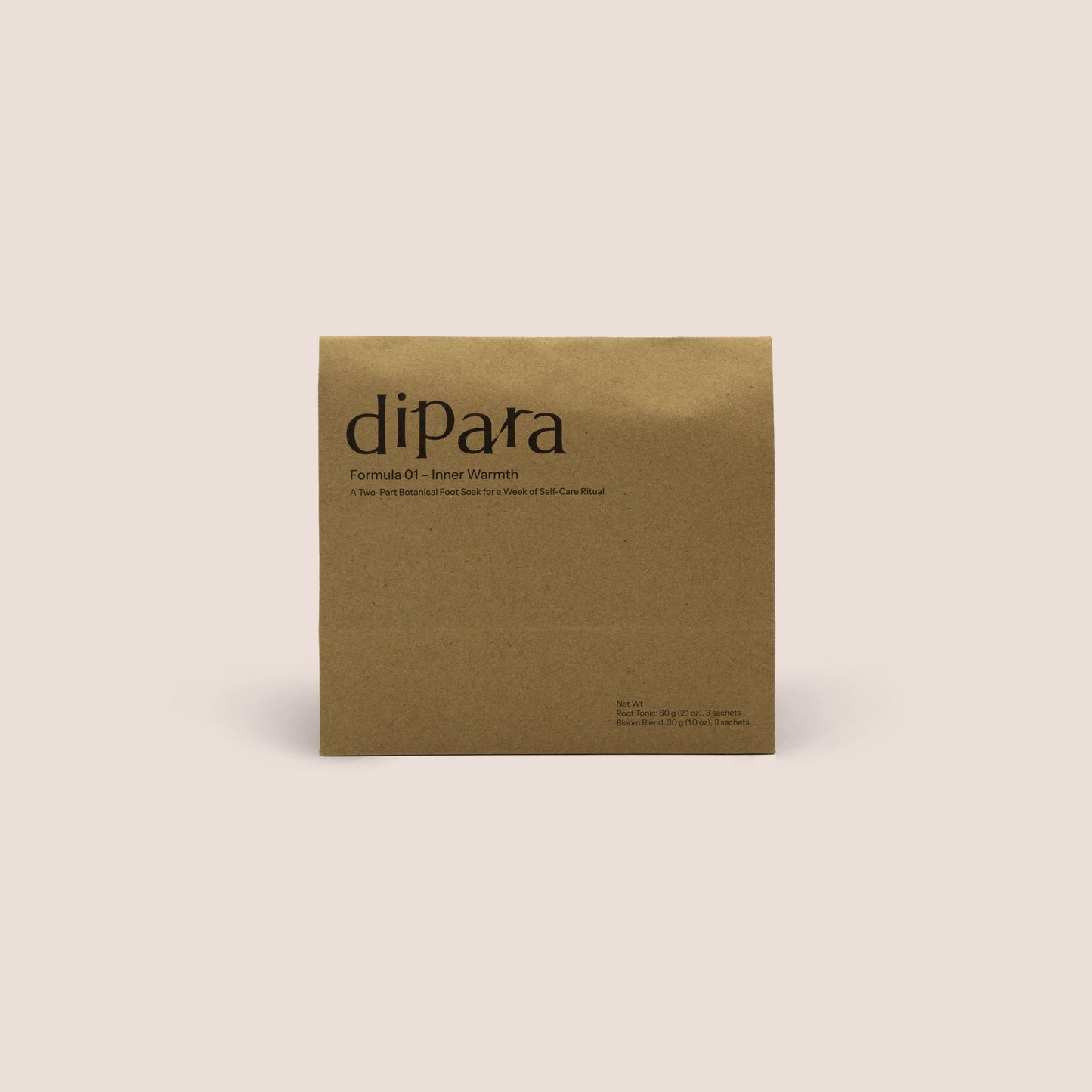 Dipara Formula 01 Inner Warmth herbal foot soak set, in kraft paper packaging, presented in a minimalist, neutral-toned studio setting.