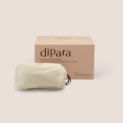Dipara Formula 01 Inner Warmth herbal foot soak box set with a foldable foot basin, presented in a minimalist studio setting.